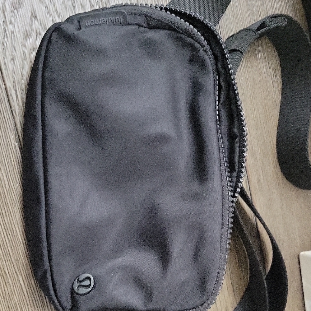 lululemon athletic Unisex Black Sling Belt Bag